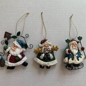 Costco Whimsical Santa Claus Christmas Ornaments Lot Of 3 Resin Wire Stars Sled